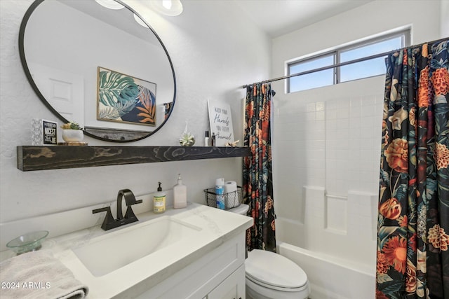 full bathroom featuring vanity, toilet, and shower / bathtub combination with curtain