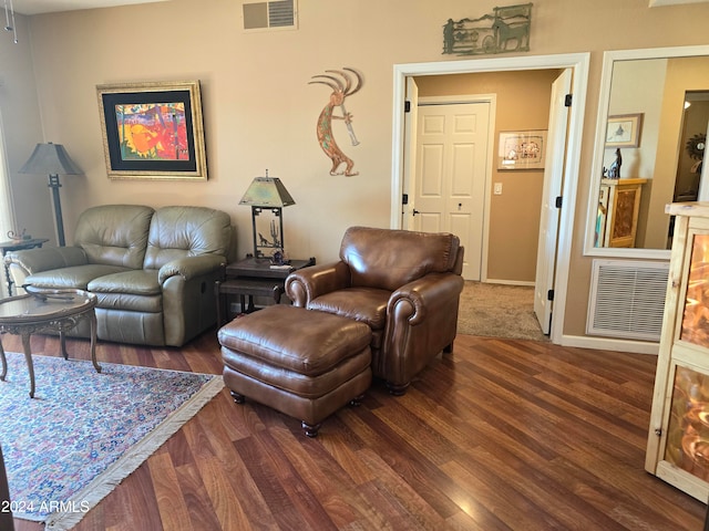 living room featuring dark hardwood / wood-style floors