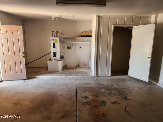 garage featuring water heater