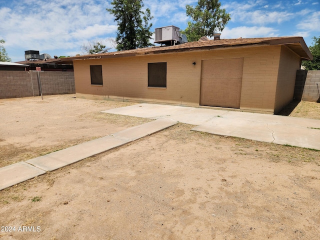 back of house featuring a patio