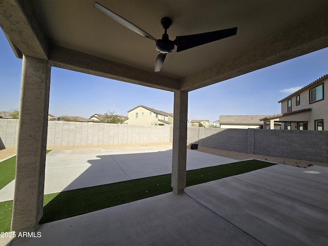 view of patio featuring ceiling fan and a fenced backyard