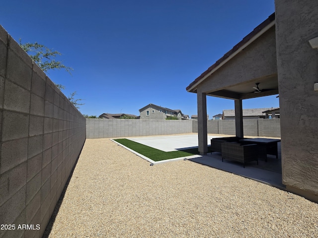 view of yard with a patio area and a fenced backyard