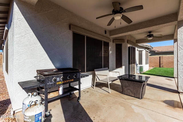 view of patio with ceiling fan