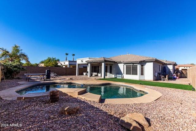 view of swimming pool with a patio area