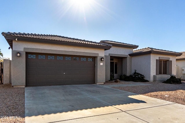 view of front of property featuring a garage