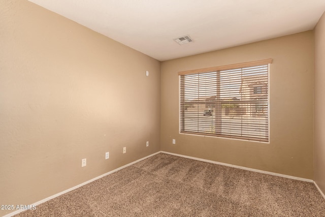 view of carpeted spare room