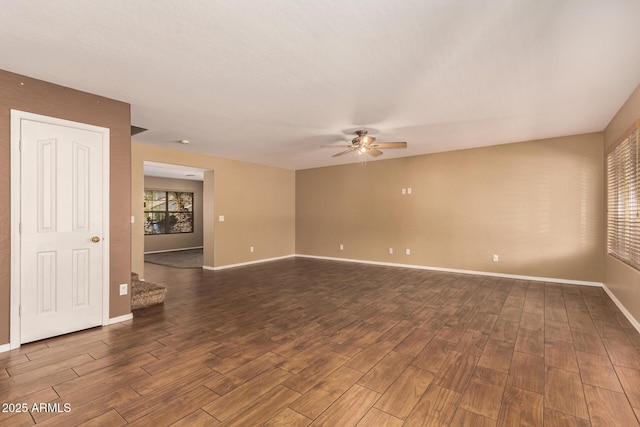 unfurnished room with ceiling fan