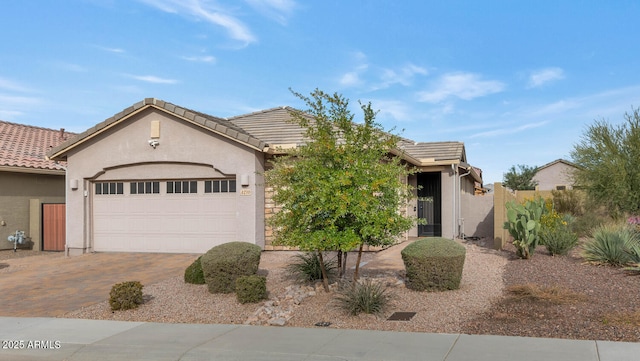 view of front of property featuring a garage