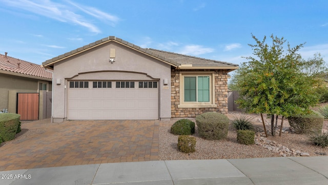 view of front of property with a garage