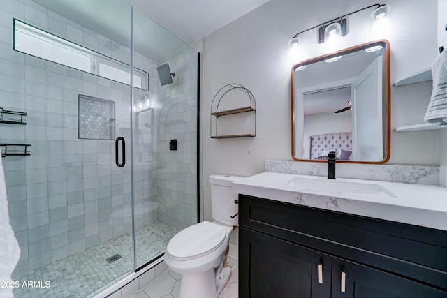 7524 N Via Del Elemental, Scottsdale, AZ 85258 - full bathroom featuring toilet, vanity, a shower stall, and tile patterned flooring