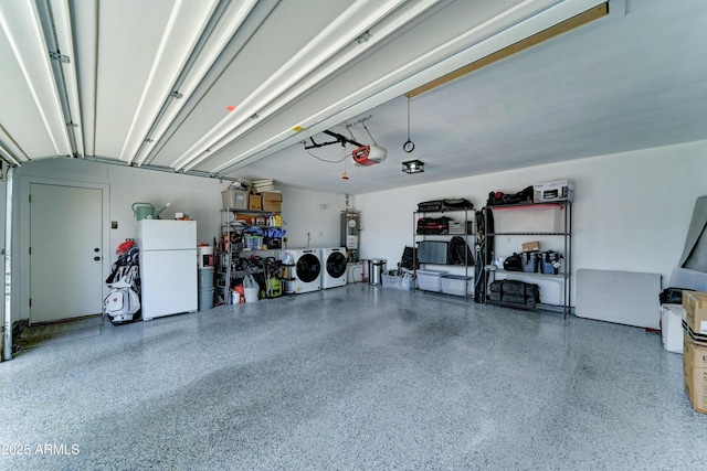 7524 N Via Del Elemental, Scottsdale, AZ 85258 - garage with freestanding refrigerator, independent washer and dryer, and a garage door opener