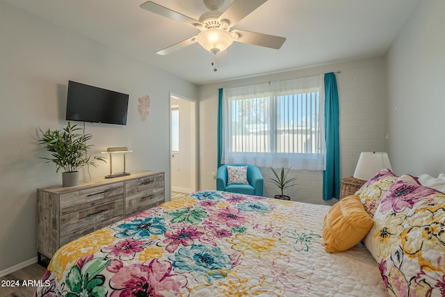 bedroom featuring wood-type flooring and ceiling fan