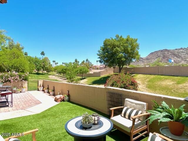 10229 N 12th Ct Unit 1, Phoenix, AZ 85020 - view of yard with a mountain view and a patio