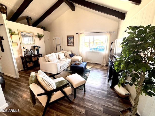 251 W 8th St, Ajo, AZ 85321 - living area featuring beam ceiling, dark wood-style floors, high vaulted ceiling, and baseboards