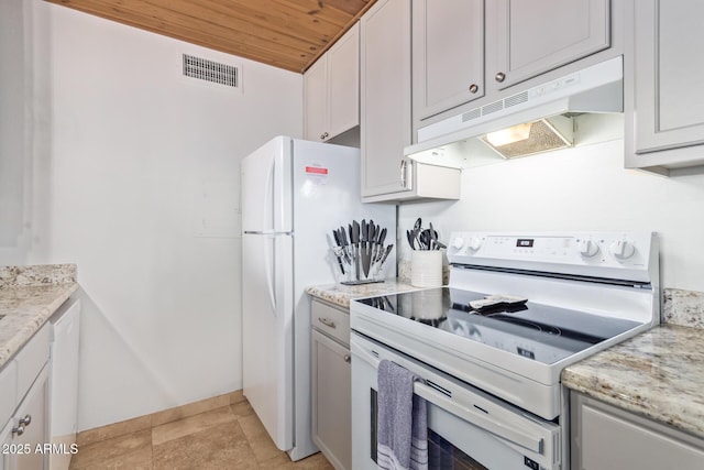 kitchen with visible vents, white appliances, wood ceiling, under cabinet range hood, and light stone countertops