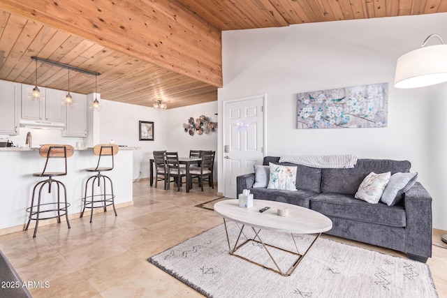 living room featuring wooden ceiling, light tile patterned floors, and vaulted ceiling