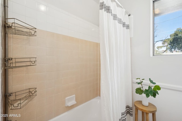 bathroom with shower / tub combo