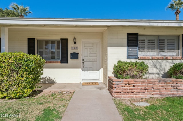 entrance to property with a porch