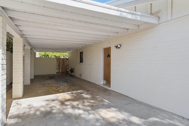 view of patio / terrace featuring a carport