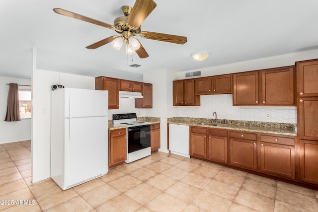 kitchen featuring tasteful backsplash, sink, ceiling fan, light stone counters, and white appliances