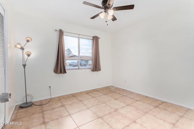 unfurnished room with ceiling fan