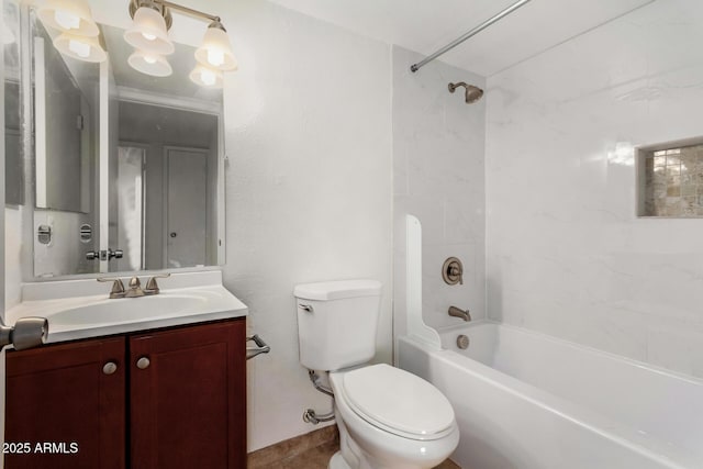 full bathroom featuring tiled shower / bath combo, vanity, and toilet