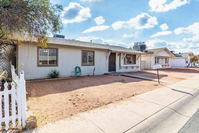 ranch-style house with central AC