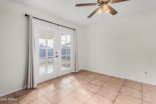 doorway with light tile patterned floors, ceiling fan, and french doors