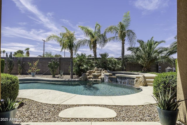 1123 E Shepherds Way, Casa Grande, AZ 85122 - view of swimming pool featuring a fenced backyard and a pool with connected hot tub