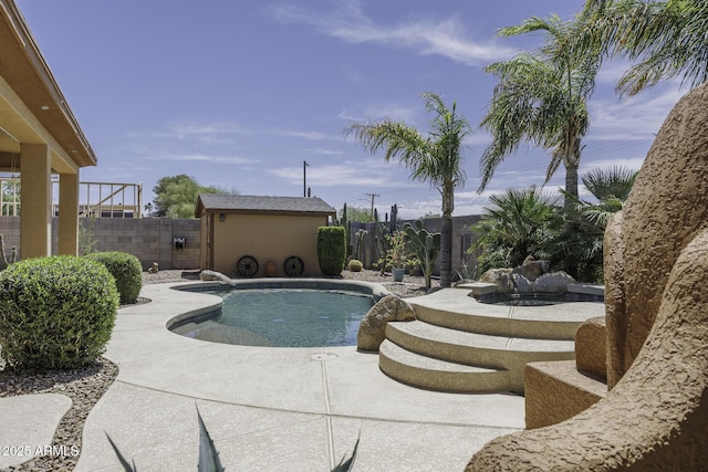 1123 E Shepherds Way, Casa Grande, AZ 85122 - view of pool with a fenced backyard, a patio, an outdoor structure, and a shed
