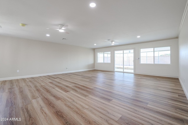 empty room featuring recessed lighting, baseboards, light wood-style floors, and ceiling fan