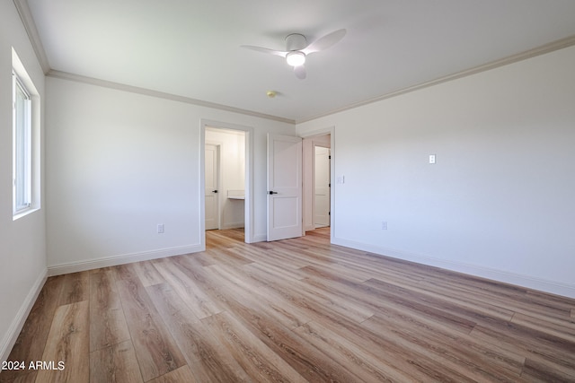 unfurnished bedroom featuring light wood-type flooring, ornamental molding, and ceiling fan