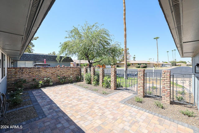 view of patio / terrace featuring fence