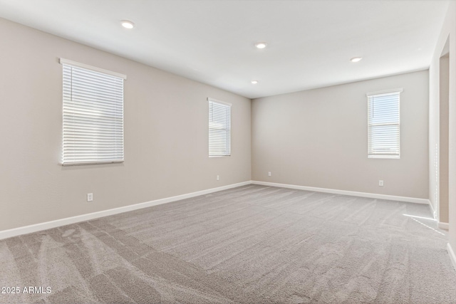 5844 E Covey Ln, Phoenix, AZ 85054 - unfurnished room featuring carpet, baseboards, and recessed lighting