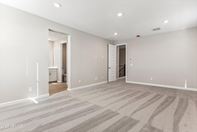 5844 E Covey Ln, Phoenix, AZ 85054 - unfurnished room featuring light carpet, recessed lighting, and baseboards
