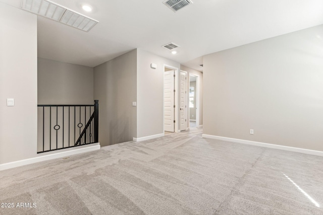 5844 E Covey Ln, Phoenix, AZ 85054 - spare room featuring carpet flooring, baseboards, and recessed lighting
