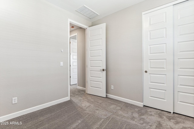5844 E Covey Ln, Phoenix, AZ 85054 - unfurnished bedroom with carpet, a closet, and baseboards