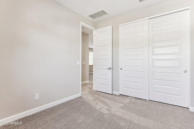 5844 E Covey Ln, Phoenix, AZ 85054 - unfurnished bedroom with carpet floors, baseboards, and a closet
