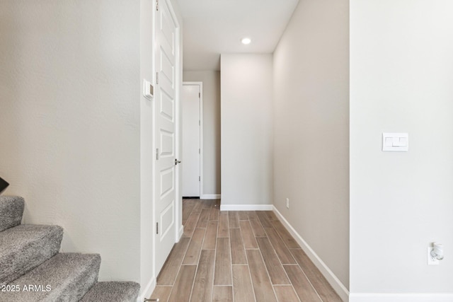 5844 E Covey Ln, Phoenix, AZ 85054 - hall with light wood-style floors, stairs, baseboards, and recessed lighting