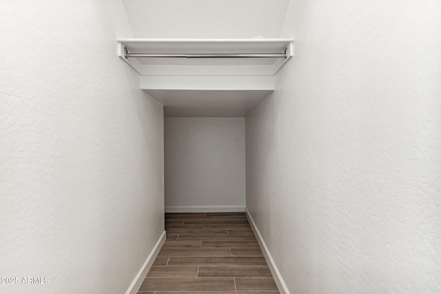 5844 E Covey Ln, Phoenix, AZ 85054 - spacious closet featuring wood finish floors