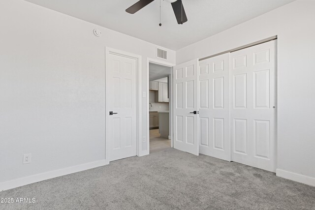 bathroom with tile patterned flooring, toilet, and vanity