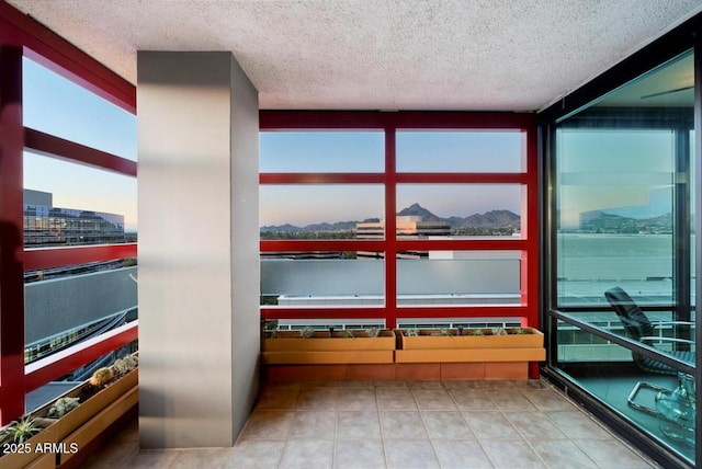 details featuring a city view and a textured ceiling