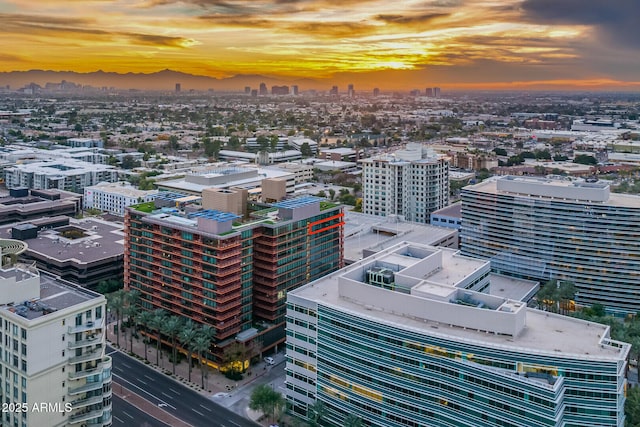 birds eye view of property featuring a city view