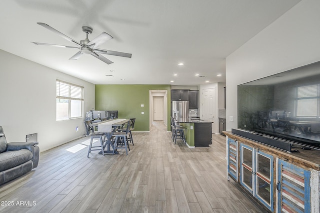 9934 E Orange Grove St, Florence, AZ 85132 - dining area featuring light wood-style floors, recessed lighting, and ceiling fan
