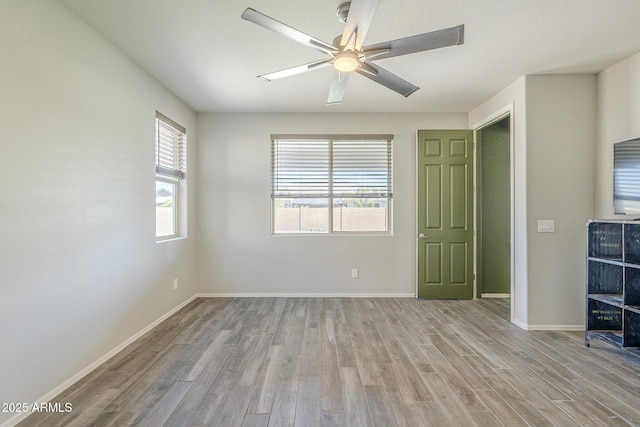 9934 E Orange Grove St, Florence, AZ 85132 - unfurnished bedroom with wood finished floors and a ceiling fan