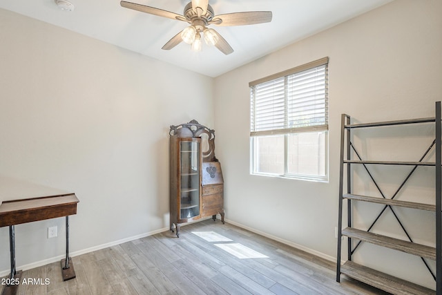 9934 E Orange Grove St, Florence, AZ 85132 - misc room with healthy amount of natural light, wood finished floors, and a ceiling fan