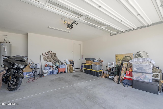9934 E Orange Grove St, Florence, AZ 85132 - garage with electric water heater and a garage door opener