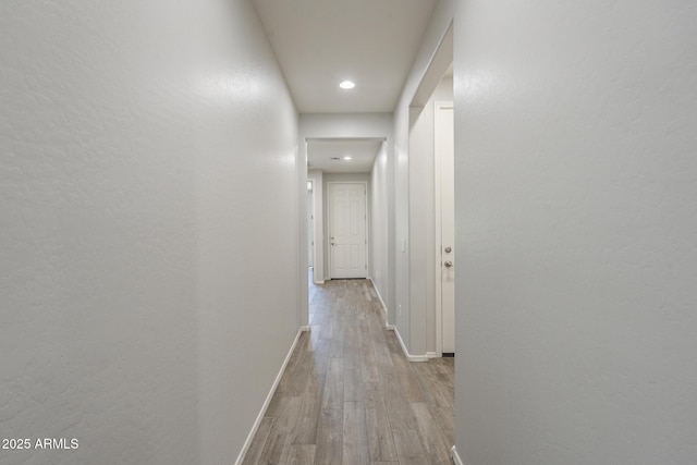 9934 E Orange Grove St, Florence, AZ 85132 - hall featuring wood finished floors and recessed lighting