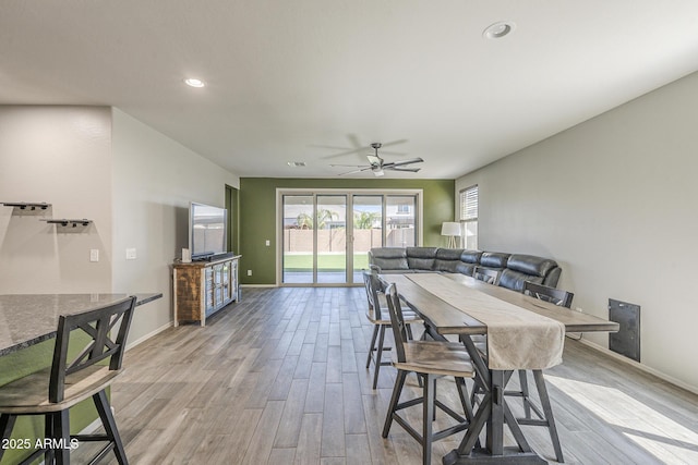 9934 E Orange Grove St, Florence, AZ 85132 - dining area featuring light wood-type flooring, a ceiling fan, and recessed lighting