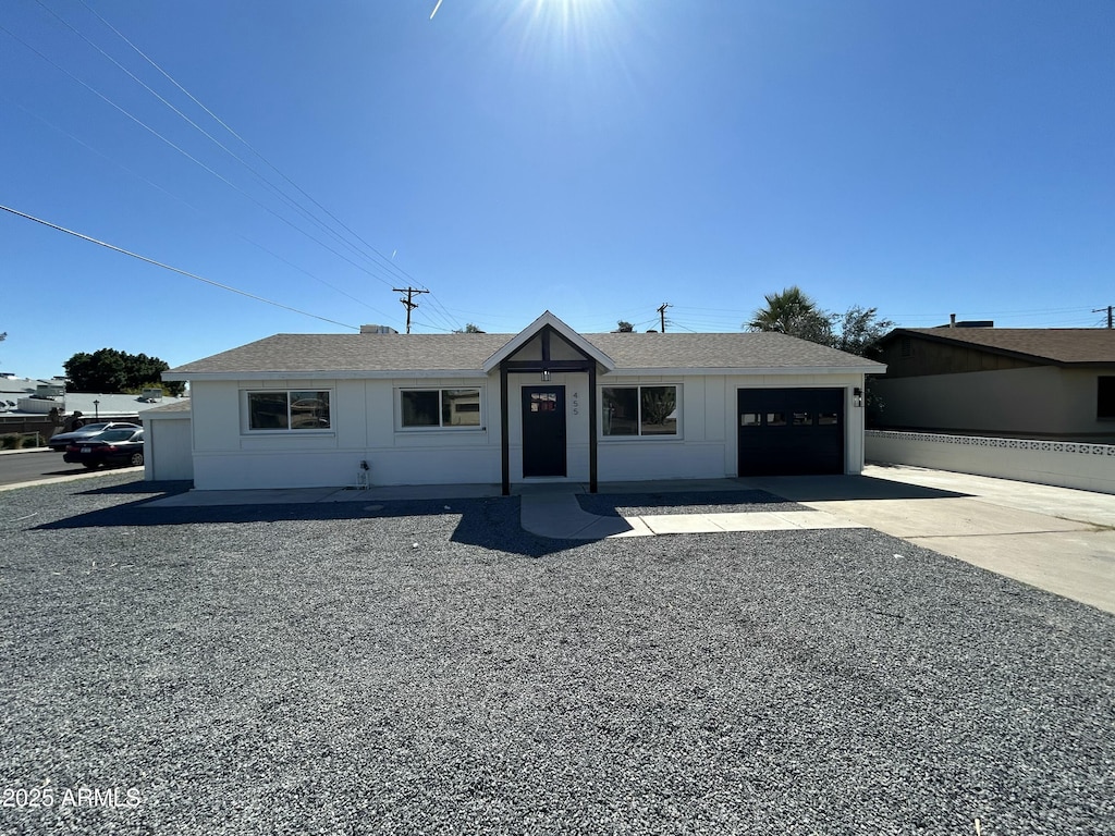 455 E Garfield St, Tempe, AZ 85288 - ranch-style home featuring driveway, roof with shingles, and an attached garage